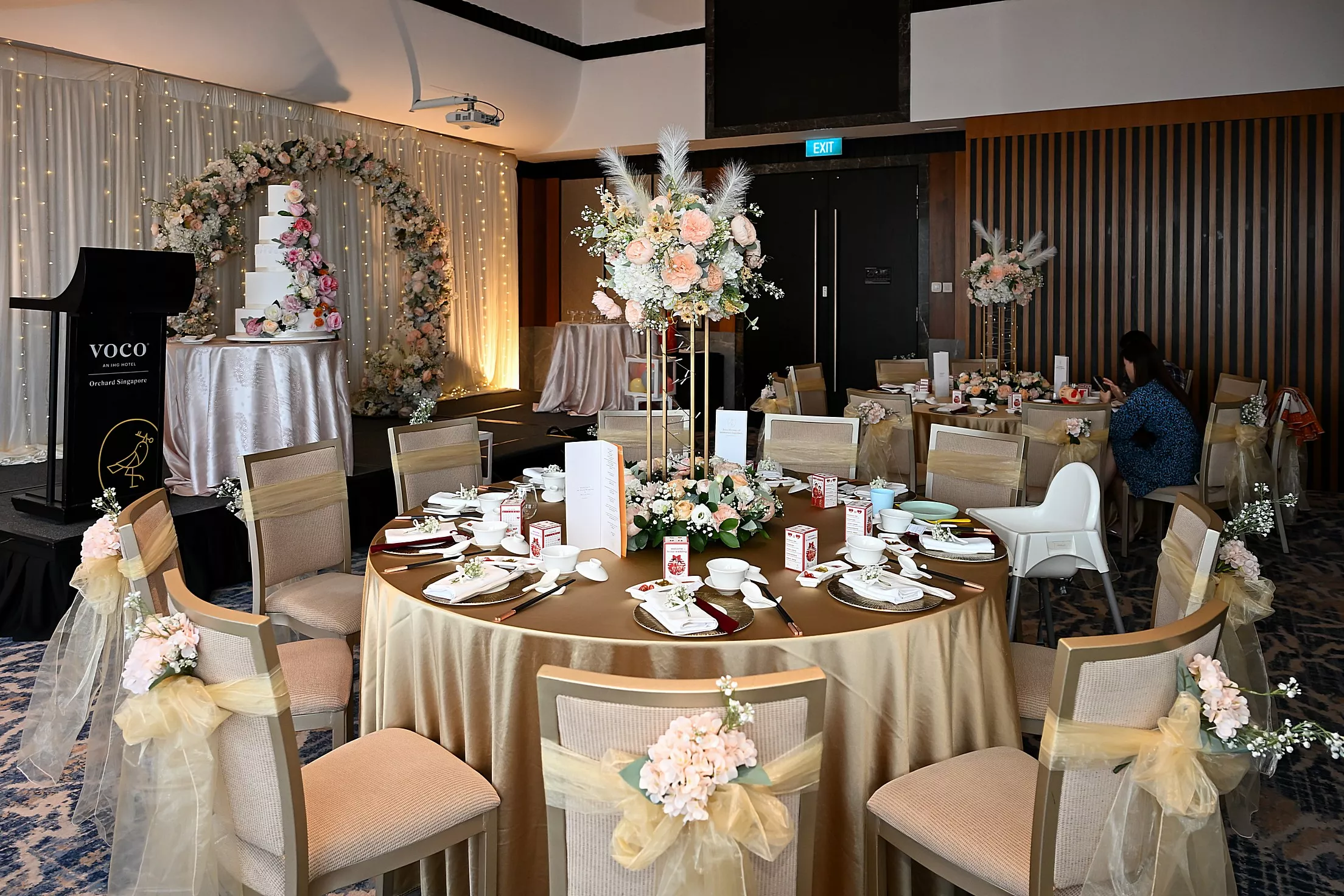 Spacious banquet dining table setup at a Singapore hotel ballroom