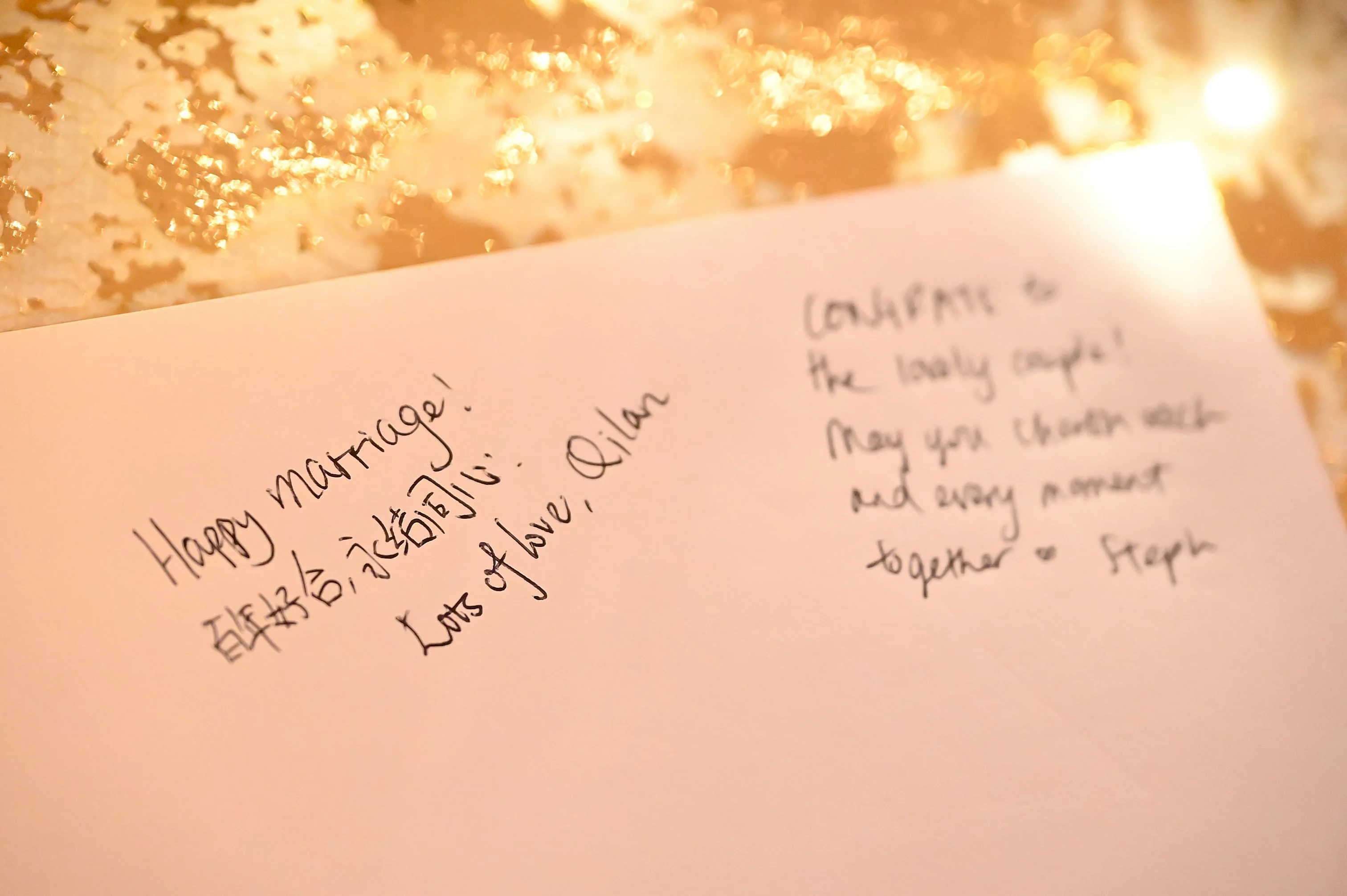 Handwritten congratulatory note written by a guest for the newlyweds