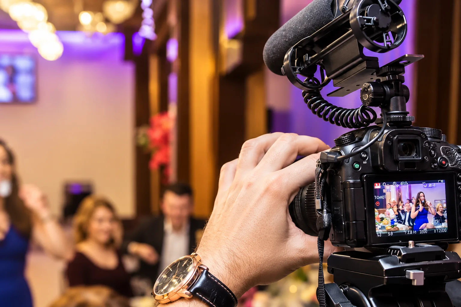 Professional Videographer Filming Event Highlights
