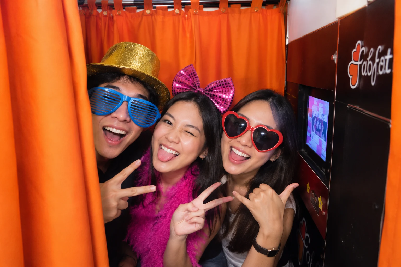 Guests Having Fun Behind the Curtain